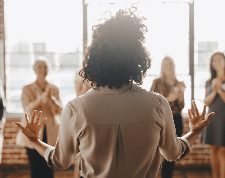 Woman leading meditation group